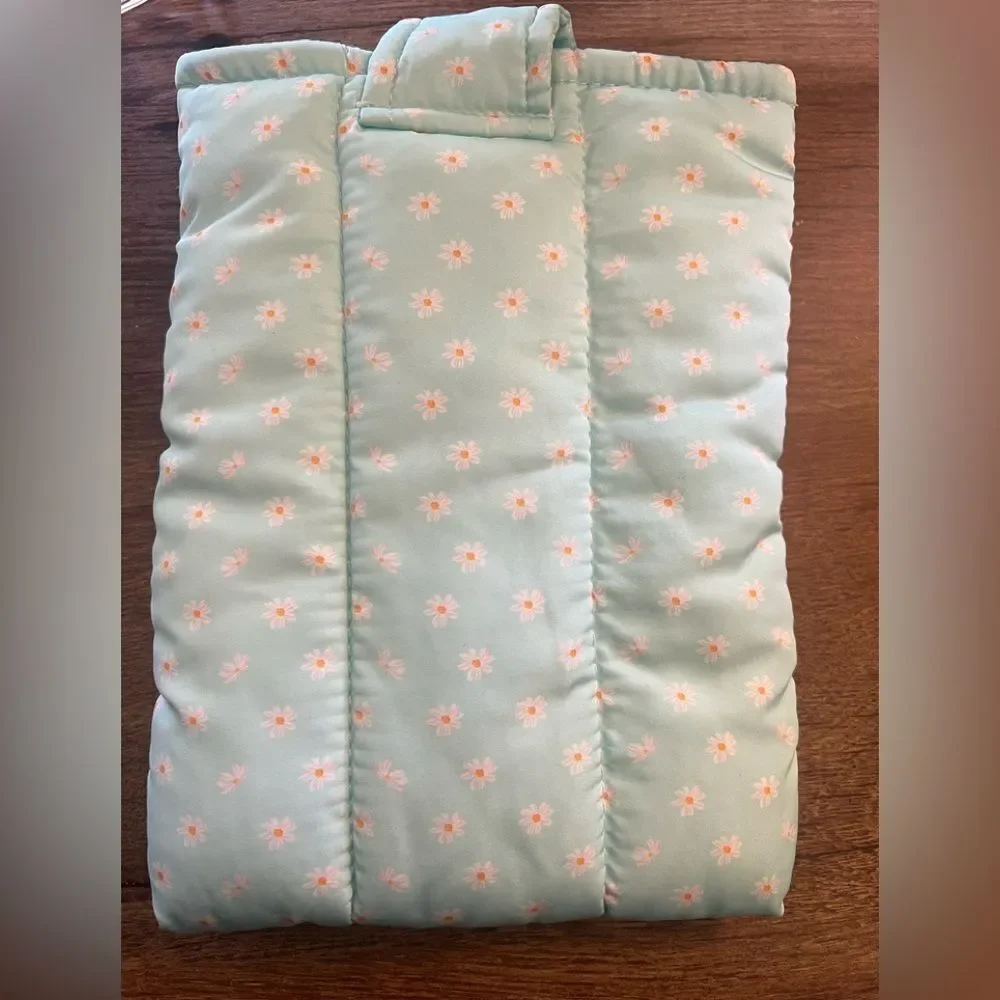 Light Blue Quilted Book Sleeve with Orange Text